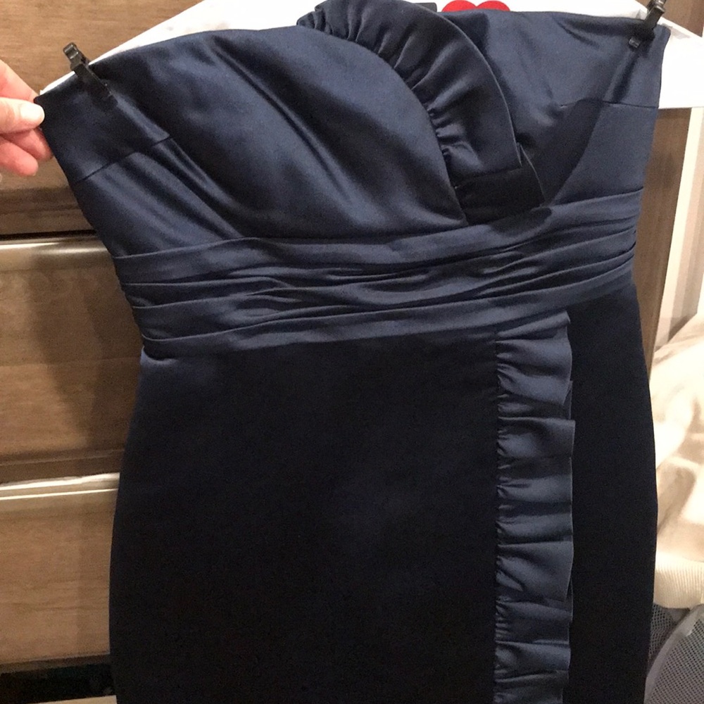 Navy blue strapless dress.